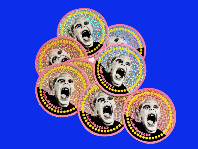 Set of circular stickers with a Bat Boy design on a Glittery background