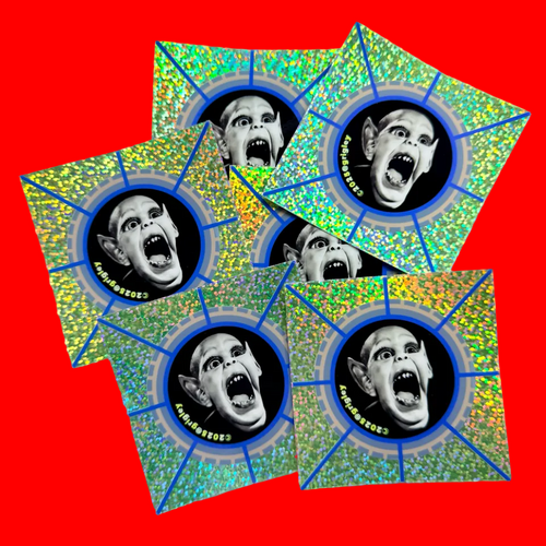Three colorful coasters with a central image of Bat Boy screaming, on a red background.