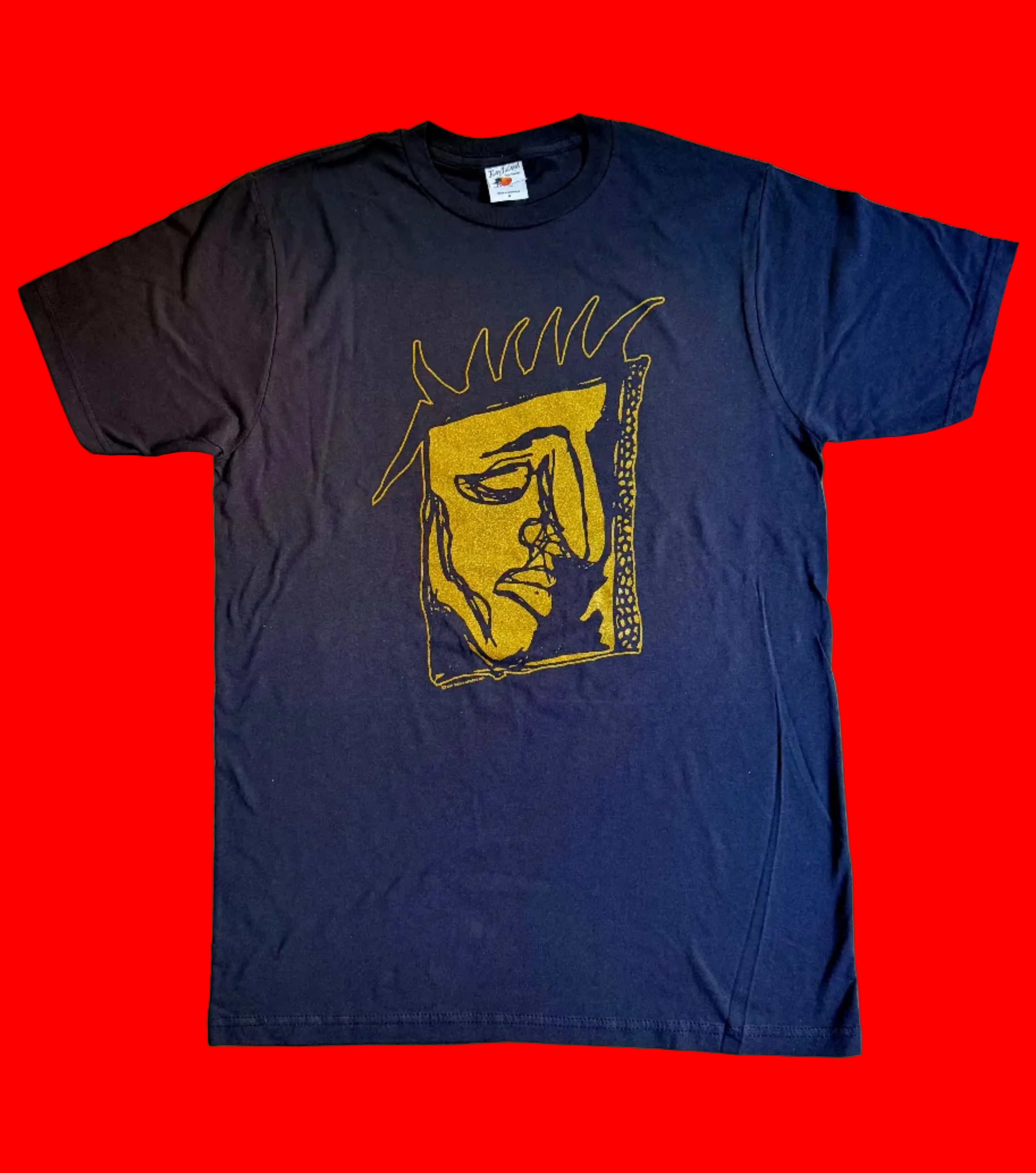 Charcoal Grey t-shirt with a golden printed graphic on a solid red background