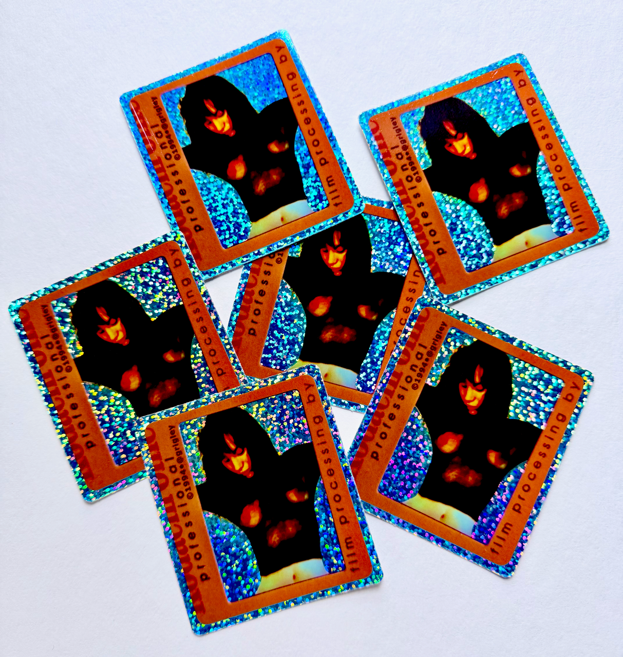 Set of trading cards with a character on a white background