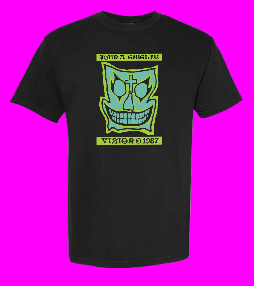 Black t-shirt with a green Vision Skates Grigley Pro Model graphic design on a solid background
