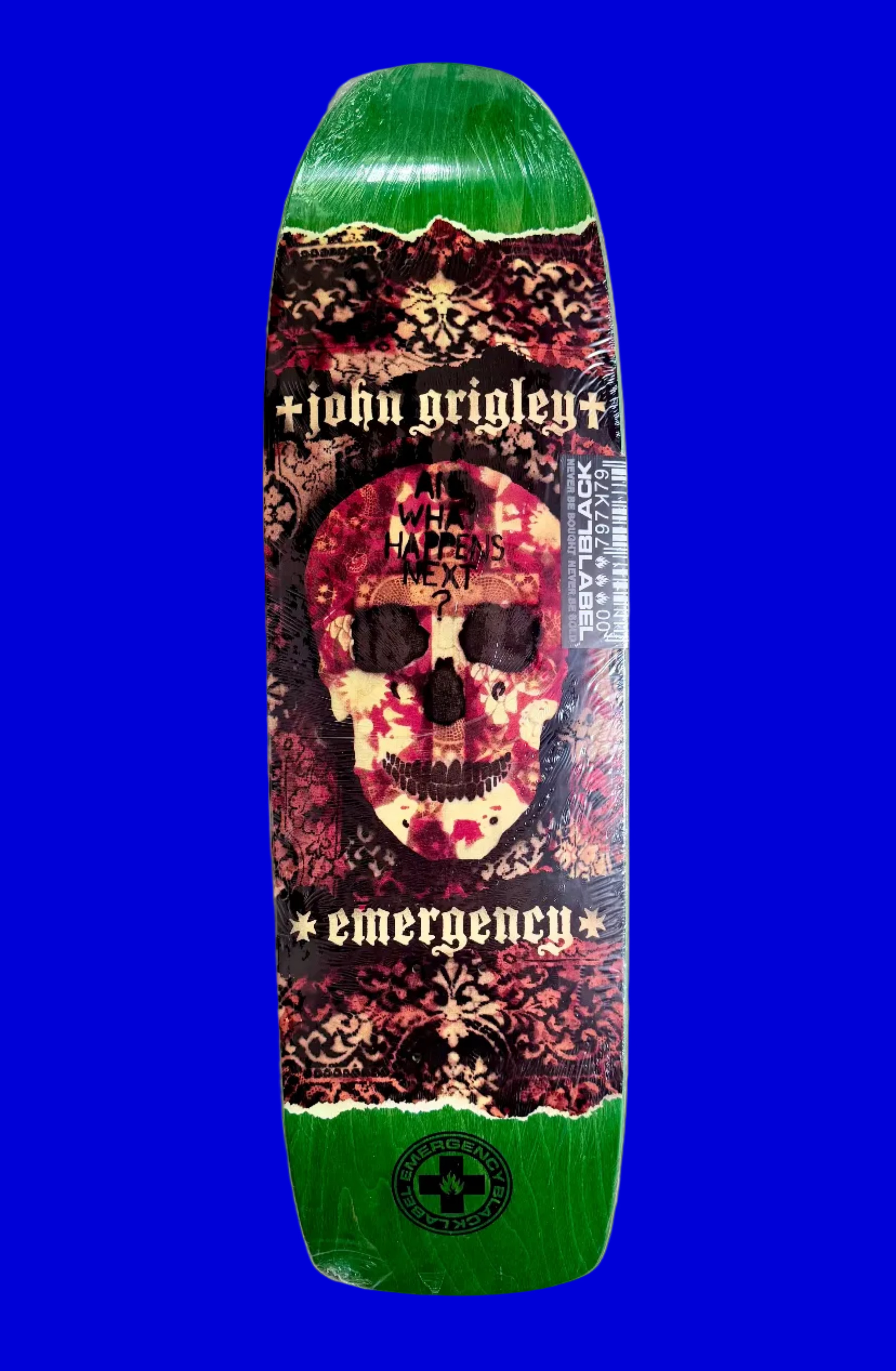 Skateboard deck with a colorful design featuring a skull on a solid background.