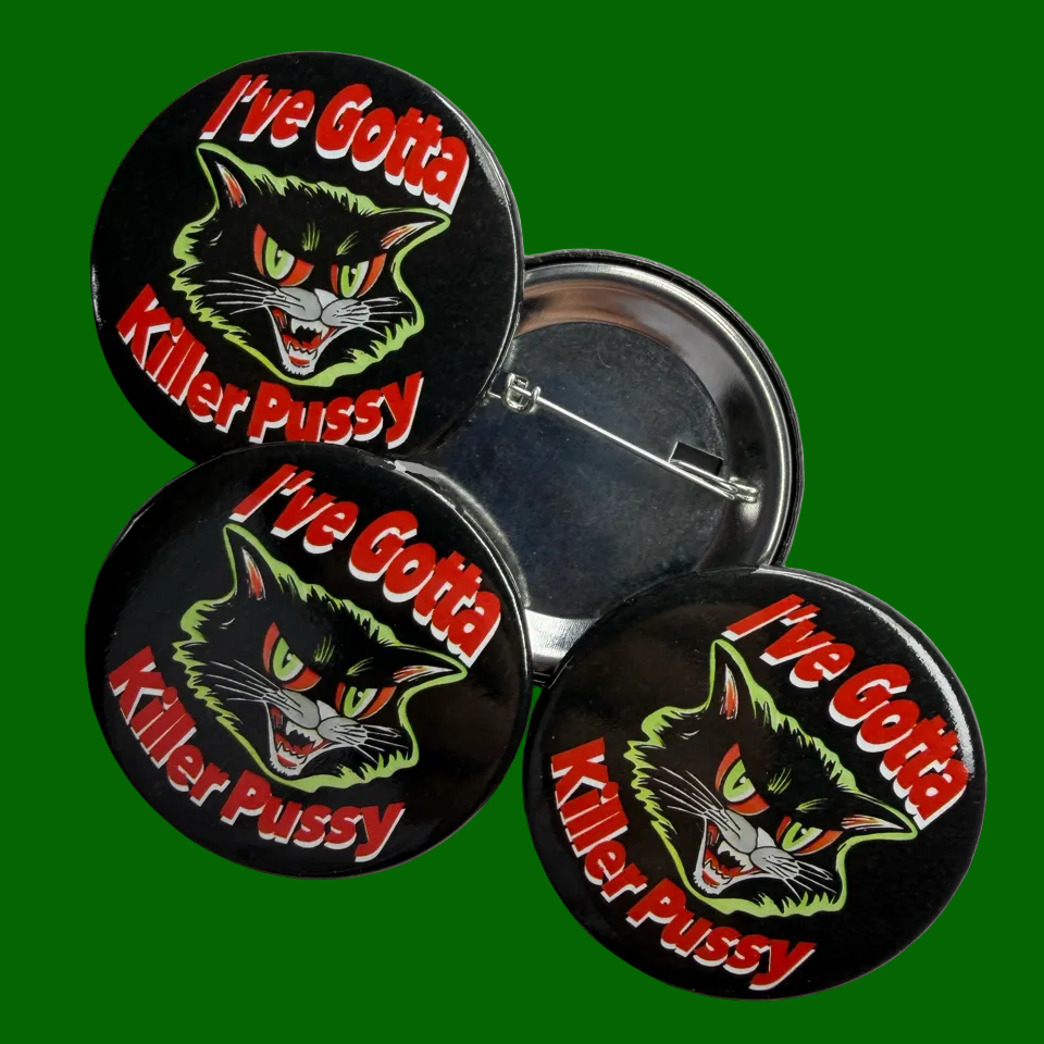Three 'I've Gotta Killer Pussy' buttons with a cat graphic on a gray background